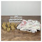 (34pc) NAPKINS & NAPKIN RINGS | Including: Set of 14 Pottery Barn napkins, 10 brass sunflower napkin