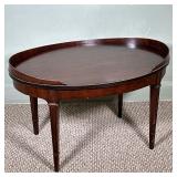 Wooden Oval-Shaped Coffee Table | Wooden oval-shaped coffee table in dark finish. - h. 17 x w. 29.75