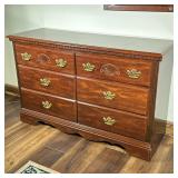 Six-Drawer Wooden Dresser | Six-drawer wooden dresser with gold hardware and carved details. - h. 31