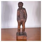 Paul-Emile Caron (Canadian, 1915-1987) Wood Carving | Wooden carving of a man standing with hands in