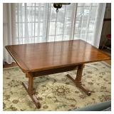 Large Wooden Dining Table | Large wooden dining table with H-stretcher across bottom and leaves for 