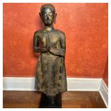 Mandalay Monk Statue | Antique (late 19th c.) Mandalay (Burma) carved wood, gold gilt monk statue. -