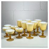 (12pc) AMBER MILK GLASS GLASSES | Including 7 water goblets and 5 champagne glasses - h. 7 x dia. 3.