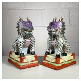 (2pc) PAIR OF COLORFUL CERAMIC FOO DOGS | Pair of colorfully glazed ceramic foo dogs with gilt desig