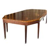 RALPH LAUREN / HENREDON CARVED WOOD DINING TABLE | Having burlwood veneer center with carved sides a