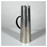Jug | Stainless steel jug by Gabis of Sweden. Glass stirrer. - h. 11.5 x dia. 4 in