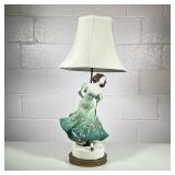 CERAMIC FIGURINE LAMP | Ceramic lamp with figurine of a woman - h. 31 x w. 10 x l. 10 in