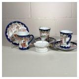 (8pc) Japanese Tea Cups | Blue rimmed cups and saucers with geisha girls. Tea strainer marked Japan.