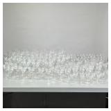(87pc) HUGE LOT CRYSTAL/GLASSWARE | Including: 34 red wine glasses, 12 champagne glasses, 8 white wi