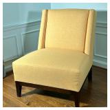 ROOM & BOARD CHAIR | Yellow upholstered chair by Room & Board. Muted windback design; in the style o