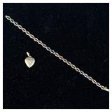 14K & 10K GOLD JEWELRY | Designed as a 14K white, yellow, and rose gold bracelet, alternating every 