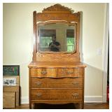 CARVED WOOD DRESSER & MIRROR | Carved wood dresser with attached mirror having carved finial over 2 