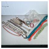 Vintage Costume Jewelry | Variety of beads, coral, faux pearls and bracelets.