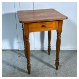 SMALL WOOD SIDE TABLE | Having a single drawer over spindle carved legs - h. 27.5 x w. 19.5 x d. 19.