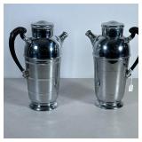 (2pc) Cocktail Shakers | Chrome shakers with black handles. Both by Farber Brothers. - d . 11 x w. 8