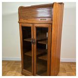 Roll-Top Display Cabinet | Vintage (mid 20th c.) tall roll-top display cabinet with glass doors, inn