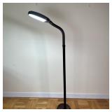 Black Adjustable Arm Floor Lamp | Modern floor lamp with painted black round base, lamp pole and adj