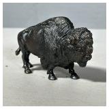 STEEL BUFFALO FIGURINE | Heavy cast steel buffalo figure - h. 2.5 x w. 1.5 x l. 4 in