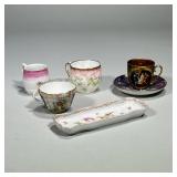 (5pc) Teacups And Small Tray | 4 delicate porcelain tea cups, one with saucer. Three are marked. Flo