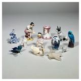 (12pc) Misc. Porcelain Items | Collection includes a duck, 3 dogs, butterfly, blue bird, 3 small vas