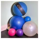 (7pc) EXERCISE BALLS & PUMP | Lot of 6 varying size exercise balls and pump.