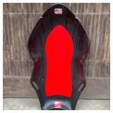 Black Plastic & Styrofoam Sled | Black plastic sled with handles and rope for pulling. Red styrofoam