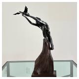MAN AND BIRD Metal Statue | Man with bird metal statue on wood base - h. 29 x w. 16.5 x d. 21 in