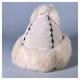 Ladies ANIMAL HIDE Fur Hat | Four pelts of animal hide is laced together with suede threading. Very 