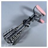 Vintage HAND HELD Egg Beater | Flint hand held mixer with pink handles. - w. 4 x l. 11 in