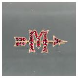 LETTER M GARNET PIN | Designed as an arrow shooting through an 