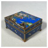 JAPANESE CLOISONNE ENAMELED FLORAL BOX | An Asian brass and colorful cloisonne lidded box, likely Ja