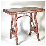 SPANISH CARVED WOOD & WROUGHT IRON TRESTLE SIDE TABLE | Having an old board top on a Spanish trestle
