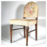 NEEDLEPOINT SIDE CHAIR | Having a floral needlepoint cushion and back rest over spindle carved legs 