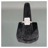 10k WHITE GOLD & CZ ENGAGEMENT RING | A 10k white gold ring mounting a large rectangular cubic zirco