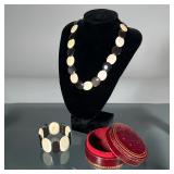 (3pc) B. ALTMAN JEWELRY BOX & PUNESUK BRACELET | A round velvet-lined leather jewelry box marked 