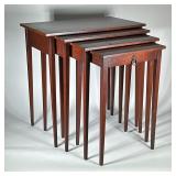 (4pc) NESTING TABLES | Graduating nesting tables with single drawer in the smallest. Dimensions: h. 