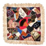 19TH CENTURY EMBROIDERED PATCHWORK PANEL | having small shaped fragments of fabric stitched together