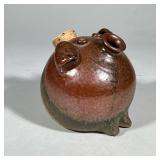 CERAMIC PIG CROCK | Ceramic multi-toned glazed pig figure with cork. Dimensions: h. 7 x dia. 7.5 in