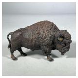 PAINTED WHITE METAL BISON FIGURE | 19th/20th century the hollow cast white metal figure decorated wi