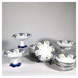 (17pc) Madeleine China | Including a pair of pedestal compotes, four-footed dishes, and 11 plates (d