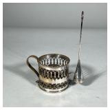 CANDLE HOLDER AND SNUFFER | Signed on bottom; snuffer is detachable. Dimensions: h. 8.75 x w. 7 in