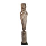 TALL WOODEN TOTEM-STYLE SCULPTURE | Carved wooden sculpture with abstract tribal-style motifs, mount