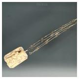 14K GOLD & CARVED BONE NECKLACE | A 14K gold chain necklace with Asian carved bone pendant; the chai