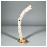GEORGE AUKSAQ CERAMIC TOTEM POLE FIGURE | Ceramic totem pole figure mounted on a stone base. Made by