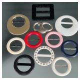 (11pc) MIXED BELT BUCKLES | Eleven assorted belt buckles including sparkly black, pink, gold, navy b