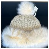 Pia Rossini Winter Hat | Pia Rossini cream-colored winter hat designed with a faux fur cuff and pouf