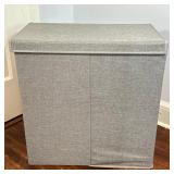 Dual Compartment Laundry Hamper | Dual-compartment laundry hamper in gray fabric/material with side 