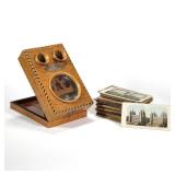 ANTIQUE FOLDING STEREOSCOPIC VIEWER & SLIDES | One large lens and two eyepieces set into a richly fi