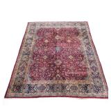 ANTIQUE PERSIAN LAVAR KIRMAN |Persian Kirman Laver rug, having a maroon ground filled with scrolling