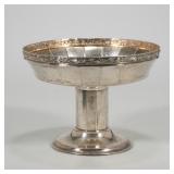 A FINE GERMAN ART NOUVEAU 800 SILVER CENTERPIECE | Having a faceted bowl with repousse rim of viney 